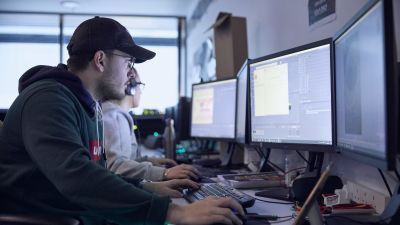 Video design student working at a computer